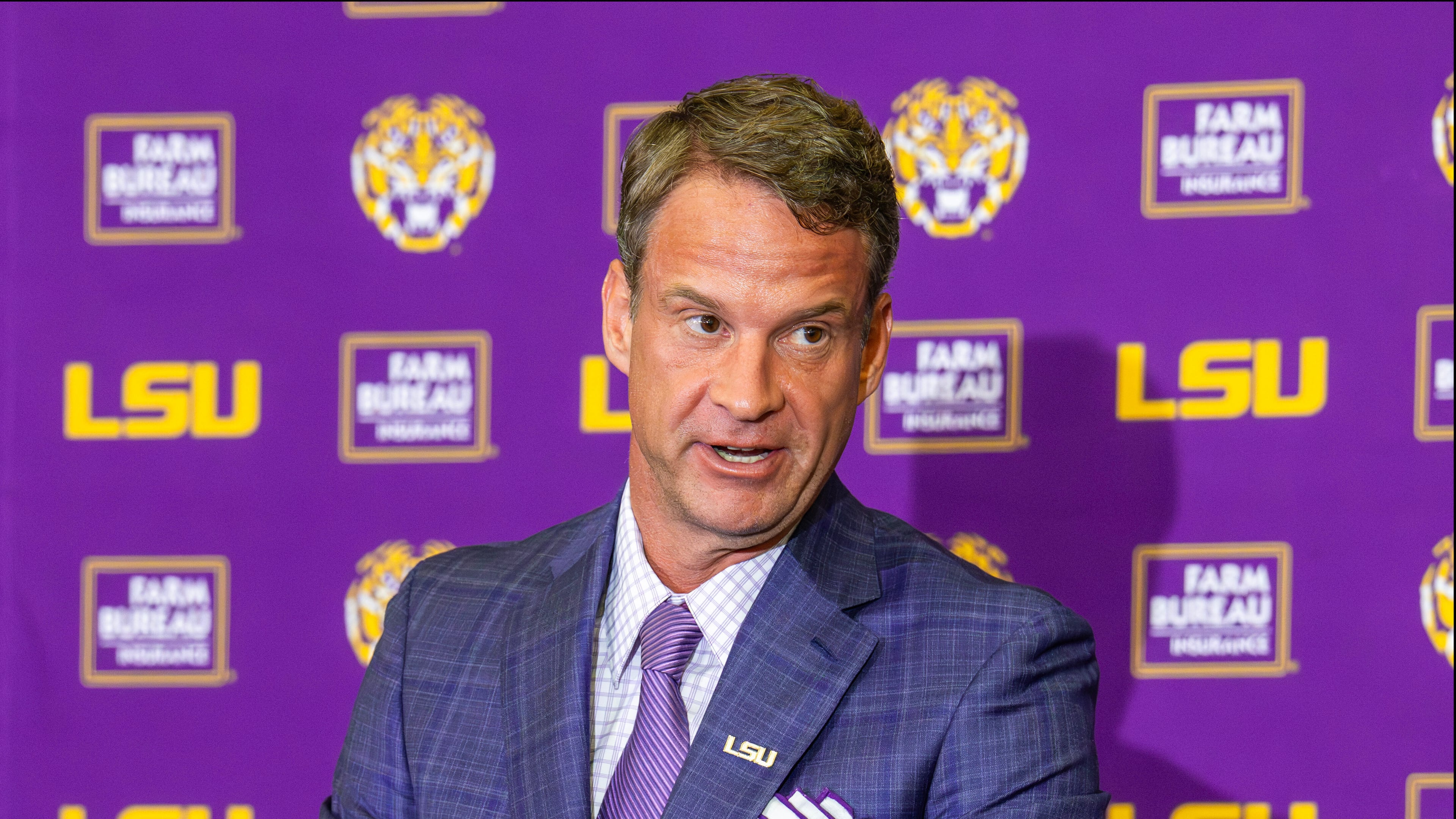 LSU's new head football coach Lane Kiffin gives an opening statement at an introductory news conference, Monday, Dec. 1, 2025, in Baton Rouge, La. (Michael Johnson/The Advocate via AP)