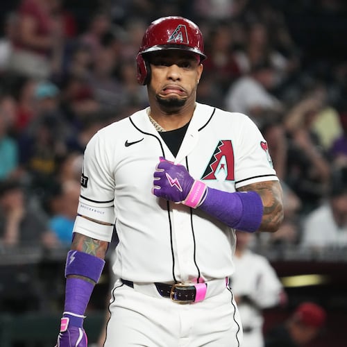Arizona Diamondbacks' Ketel Marte reacts after a wild pitch in the first inning of a baseball game against the Milwaukee Brewers, Sunday, July 5, 2026, in Phoenix. (AP Photo/Rick Scuteri)