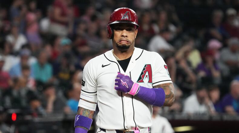Arizona Diamondbacks' Ketel Marte reacts after a wild pitch in the first inning of a baseball game against the Milwaukee Brewers, Sunday, July 5, 2026, in Phoenix. (AP Photo/Rick Scuteri)