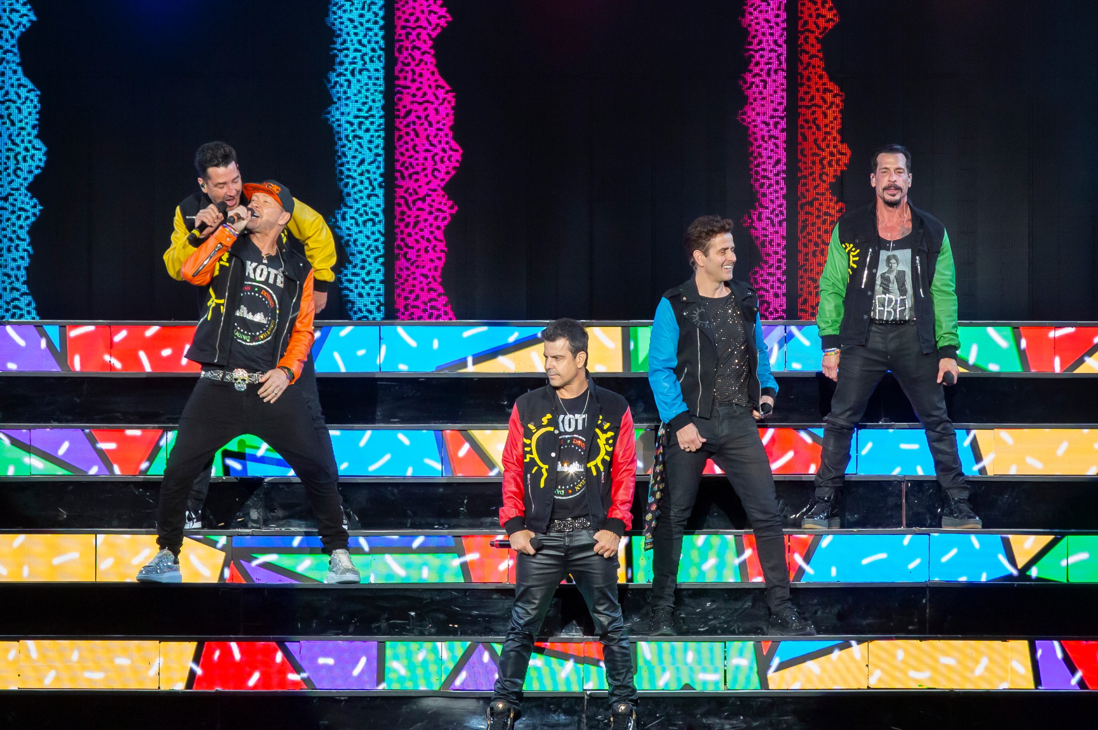 New Kids on the Block cranked out the hits to a packed house of neon clad fans at Ameris Bank Amphitheatre in Alpharetta on Friday, July 26, 2024. (RYAN FLEISHER FOR THE ATLANTA JOURNAL-CONSTITUTION)