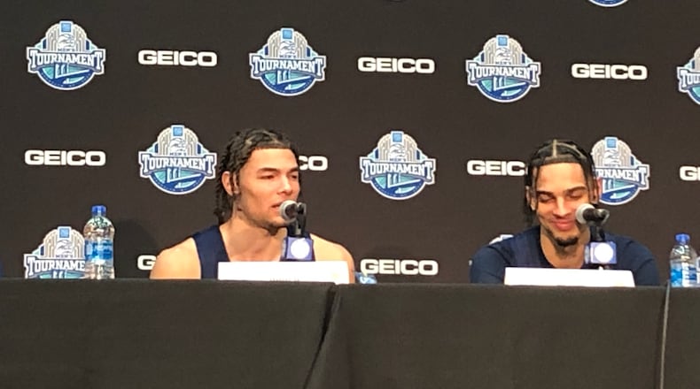 Georgia Tech forward Jordan Usher (left) and guard Michael Devoe field questions at a postgame news conference after the Yellow Jackets' 84-74 loss to Louisville in the first round of the ACC Tournament on Tuesday night in New York. (AJC photo by Ken Sugiura)