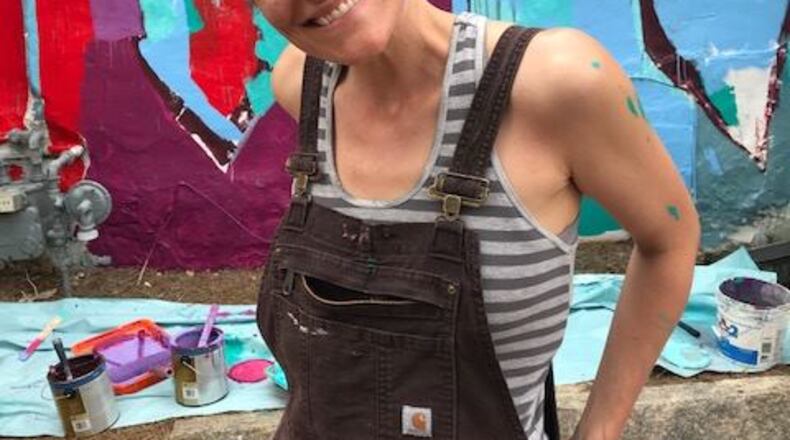 Georgia muralist Lauren Pallotta Stumberg was chosen by the Suwanee Public Art Commission to create a 3-story mural along with two free-standing five-foot-tall metal magpie sculptures for the city's newly renovated municipal court building. (Courtesy Lauren Pallotta Stumberg)