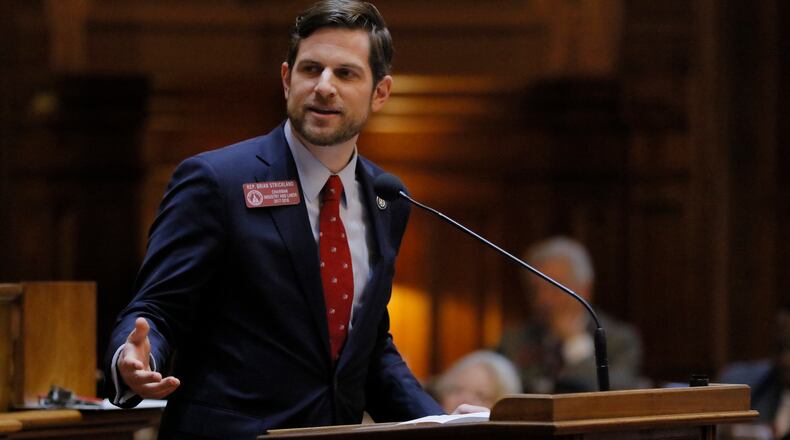 Rep. Brian Strickland, R - McDonough, presents SB 201, relating to family leave, which passed. on March 22, 2017. BOB ANDRES  /BANDRES@AJC.COM