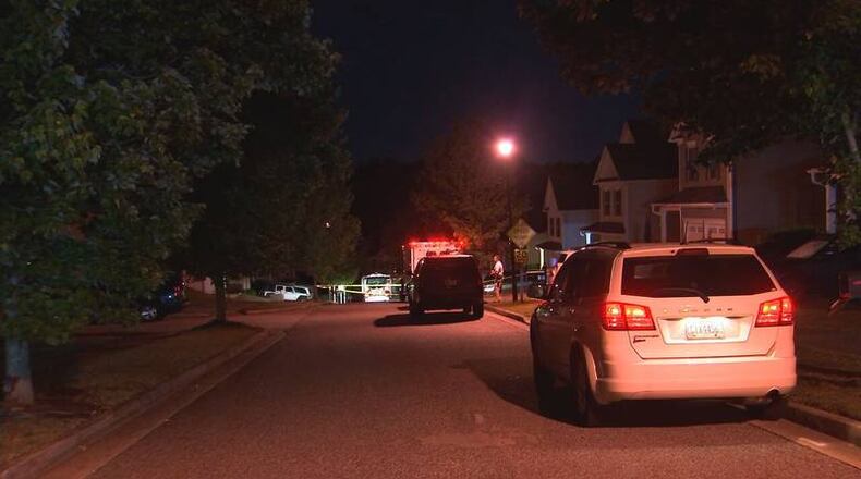 Gwinnett County police and GBI agents blocked Pine Lane near Lawrenceville to conduct an officer-involved shooting investigation Tuesday morning. A man was shot after firing on officers and striking a police dog, according to police.