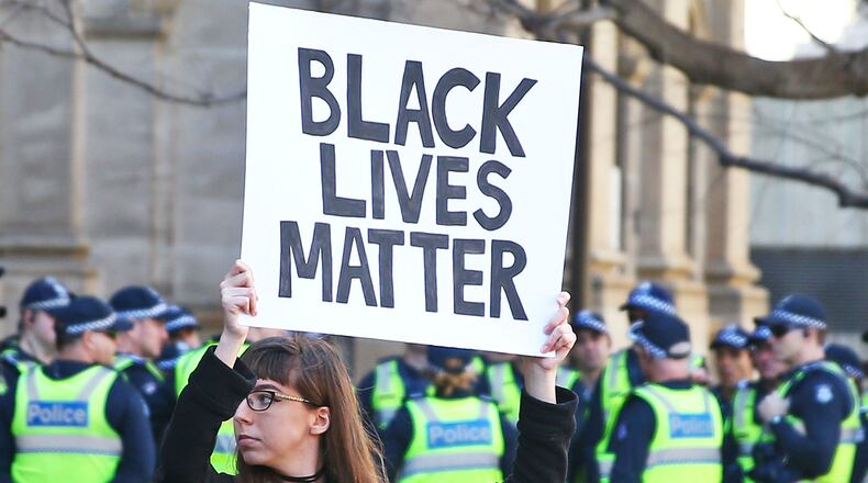 A Baltimore teacher (not picrtured) says her submission of a personalized Wells Fargo debit card that contained the message "Black Lives Matter" was rejected for being "offensive and antisocial." (Photo by Scott Barbour/Getty Images)