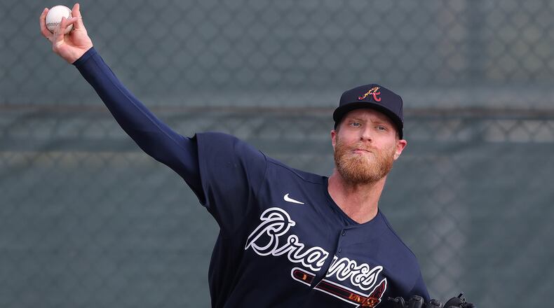 Braves starter Mike Foltynewicz delivers a pitch during the first workout of spring Thursday, Feb. 13, 2020, at CoolToday Park in North Port, Fla.