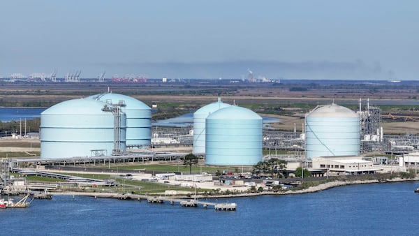 An aerial image shows Southern LNG Company’s liquefied natural gas tanks visible above the Savannah River on Wednesday, March 18, 2026. (Miguel Martinez/AJC)