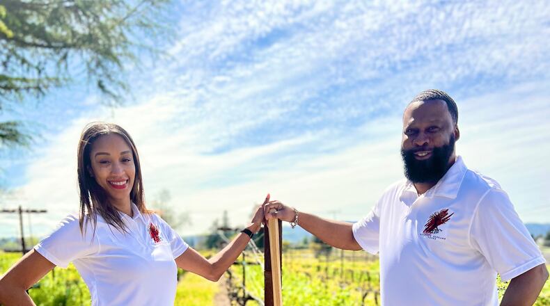 Jessena (left) and Michael Waldo are the couple behind the Divinely Elegant Vines tasting room in Austell. (Courtesy of Divinely Elegant Vines)