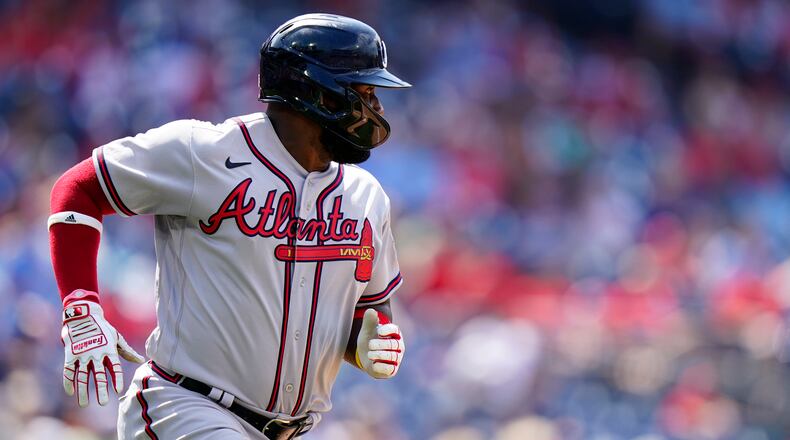 Atlanta Braves' Abraham Almonte runs to first base Thursday, June 10, 2021, against the Phillies in Philadelphia. (Matt Slocum/AP)