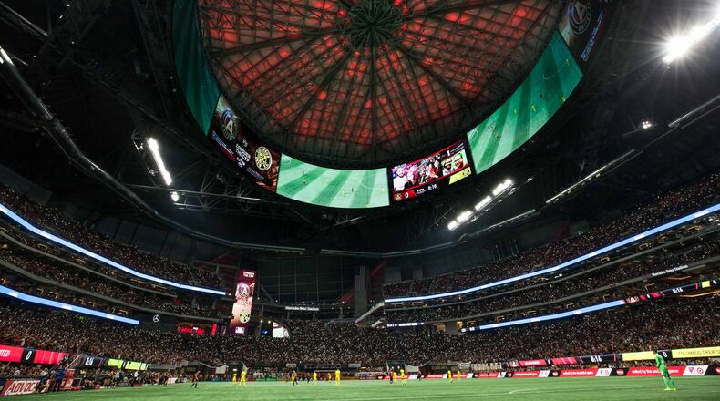 Fans hold up their cellphones during a MLS playoff game between Atlanta United and Columbus Crew at Mercedes-Benz Stadium, Thursday, Oct. 26, 2017, in Atlanta.  Columbus defeated Atlanta 1-0. BRANDEN CAMP/SPECIAL