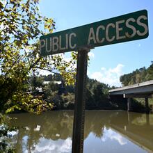 Public boating access is located across from the Flint River Outdoor Center (background), Thursday, October 19, 2023, in Thomaston. (Hyosub Shin / Hyosub.Shin@ajc.com)
