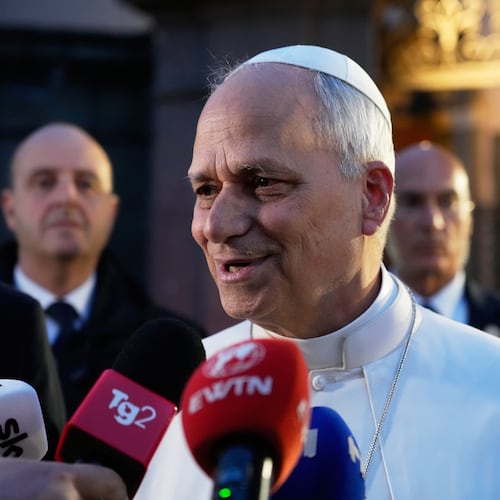 Pope Leo XIV talks to journalists as he leaves his residence in Castel Gandolfo, on the outskirts of Rome, to return to the Vatican, Tuesday, May 5, 2026. (AP Photo/Gregorio Borgia)