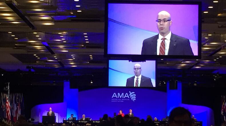 The outgoing president of the American Medical Association, Dr. Steven Stack, speaks during the organization’s 2016 annual meeting in Chicago.