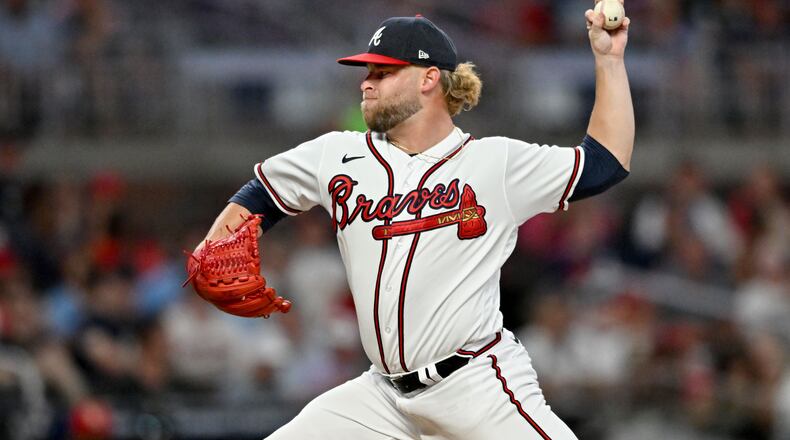 Atlanta Braves' relief pitcher A.J. Minter (33) throws a pitch against the St. Louis Cardinals during the eighth innning at Truist Park, Thursday, September 7, 2023, in Atlanta. Atlanta Braves won 8-5 over St. Louis Cardinals. (Hyosub Shin / Hyosub.Shin@ajc.com)