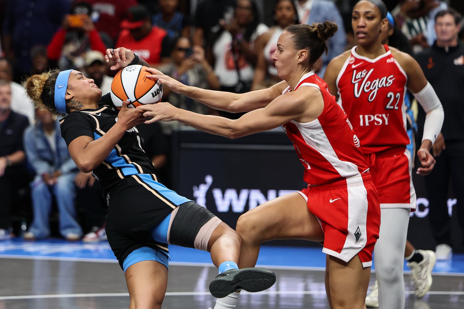 Atlanta Dream guard Te-Hina Paopao, left, loses the ball against Las Vegas Aces forward Stephanie Talbot, right, during the second half of a WNBA game at State Farm Arena on Sunday, May 17, 2026, in Atlanta. (Colin Hubbard for the AJC) 