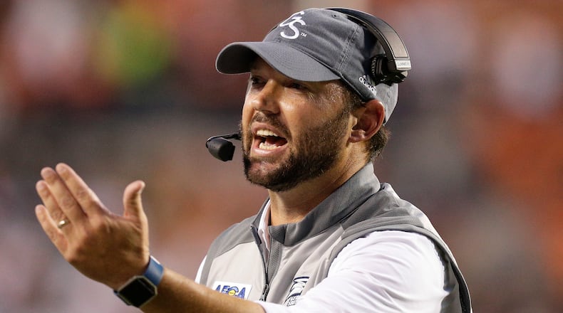 Georgia Southern head coach Tyson Summers calls in defensive players in the first half of an NCAA college football game against Auburn, Saturday, Sept. 2, 2017, in Auburn, Ala. (AP Photo/Brynn Anderson)