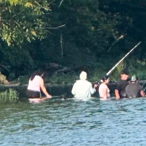 In this photo provided by Pastor Marcus L. Martin, a group of people he believes were those who died in a recent drowning accident, are shown fishing along the Scioto river in Powell, Ohio, Sunday, July 19, 2026. (Pastor Marcus L. Martin via AP)