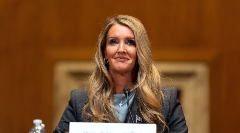 FILE - Small Business Administration administrator Kelly Loeffler listens during a hearing of the Senate Committee on Capitol Hill, May 21, 2025, in Washington. (AP Photo/Mark Schiefelbein, File)
