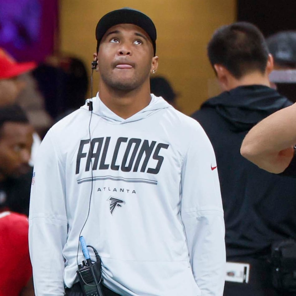 Falcons quarterback Tua Tagovailoa watches from the sidelines as his team faces the Carolina Panthers at Mercedes-Benz Stadium on Sunday, Sept. 20, 2026, in Atlanta. The Falcons expect the 28-year-old to be a positive contributor in whatever capacity his health, and opportunity, provides. (Miguel Martinez/AJC)