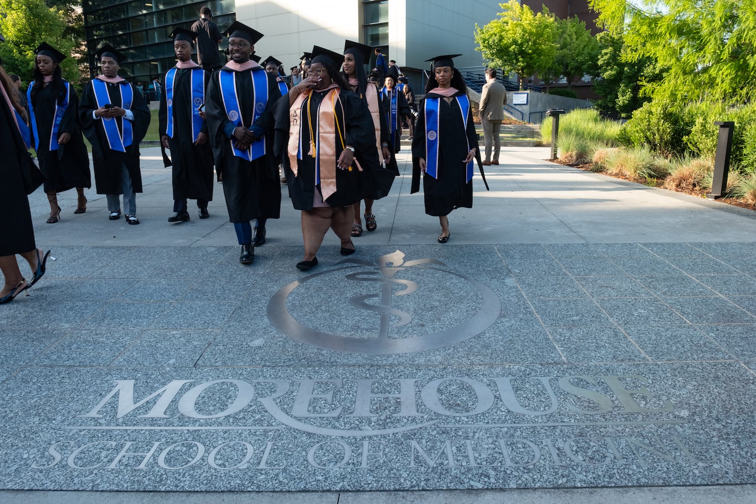 Morehouse School of Medicine students begin to line up before walking to their graduation ceremony Saturday, May 16, 2026, in Atlanta. (Ben Gray for the AJC)