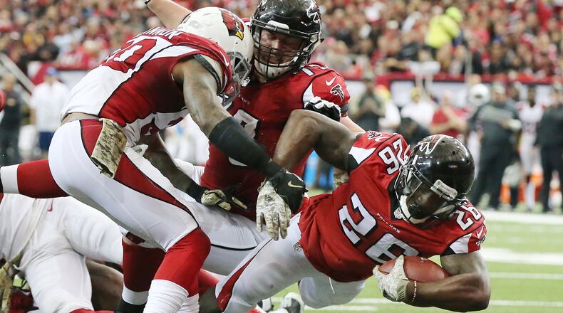November 27, 2016, Atlanta: Falcons running back Tevin Coleman dives into the endzone for a touchdown and a 24-13 lead over the Cardinals during the third quarter in an NFL football game on Sunday, Nov. 27, 2016, in Atlanta. Curtis Compton/ccompton@ajc.com