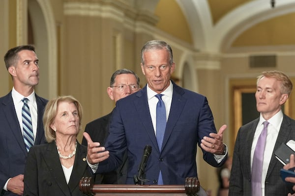 Sen. Majority Leader John Thune (center) spoke at a news conference at the Capitol last week.