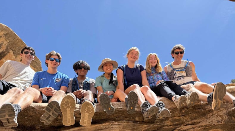 Emory University students pose for a picture with their chaplain, Brent Huckaby (right), in Utah’s Capitol Reef National Park. (Courtesy)