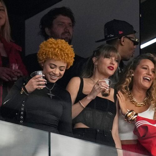 FILE - Taylor Swift, center, watches the teams before the NFL Super Bowl 58 football game between the San Francisco 49ers and the Kansas City Chiefs with Ice Spice, left, and Blake Lively, right, Feb. 11, 2024, in Las Vegas. (AP Photo/Ashley Landis, File