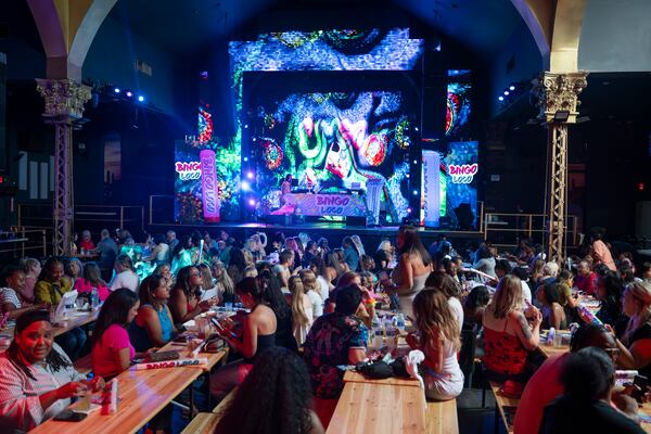 Players gather for Bingo Loco, a touring bingo rave party, at Believe Music Hall in Atlanta on Saturday, July 18, 2026. (Olivia Bowdoin for the AJC)