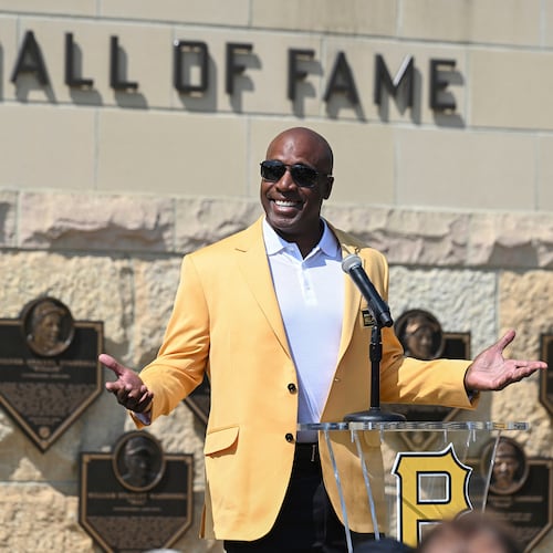 FILE - Former Pittsburgh Pirates outfielder Barry Bonds acknowledges the crowd during a ceremony for players that are part of the team's 2024 Hall of Fame class before a baseball game against the Cincinnati Reds in Pittsburgh, Aug. 24, 2024. (AP Photo/Barry Reeger, File)