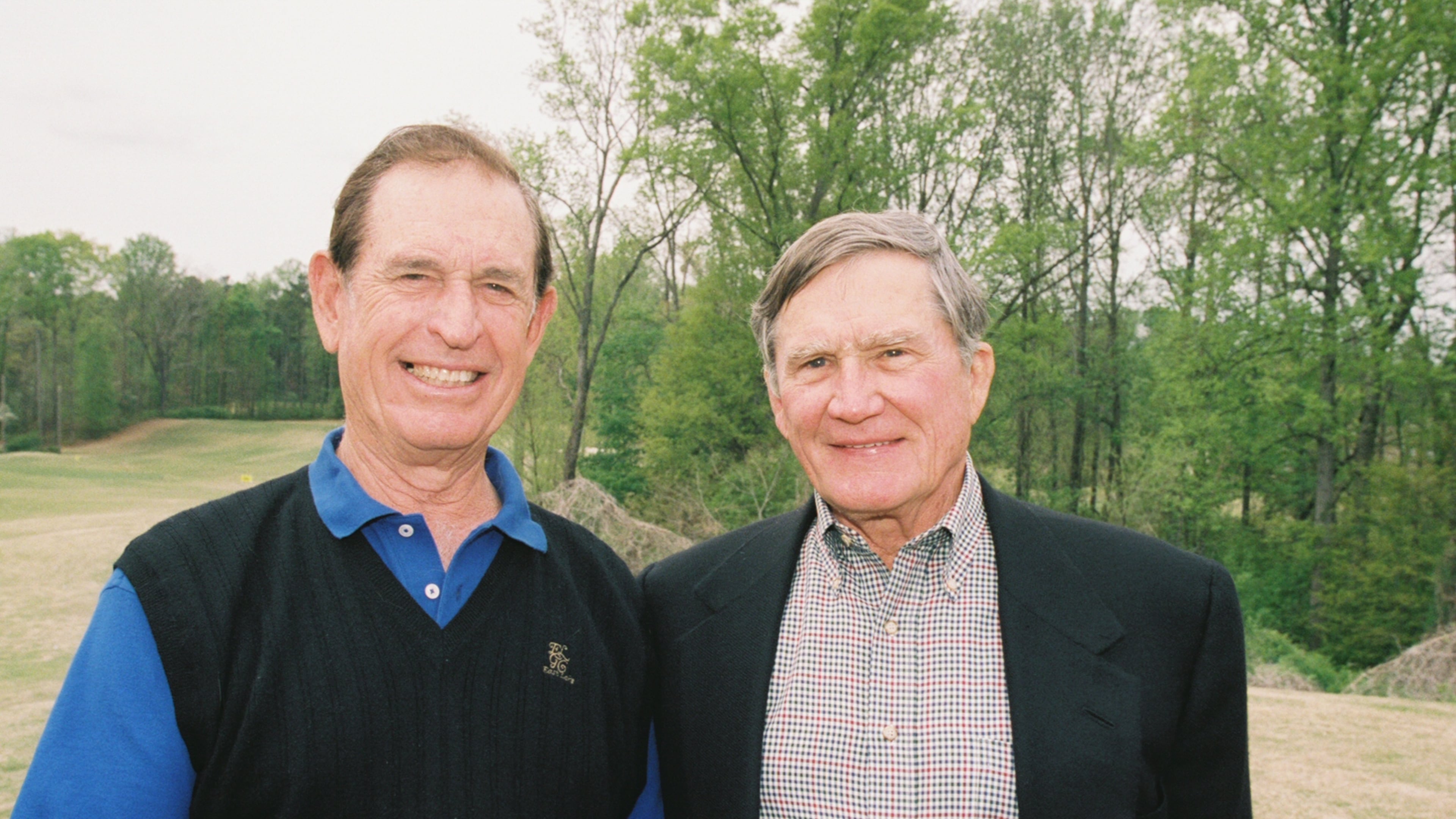 An undated photo of Charlie Harrison (left, in sweater vest) with his cousin, real estate mogul Tom Cousins at the Charlies Yates Golf Course in the East Lake neighborhood of Atlanta. (Courtesy/East Lake Foundation)
