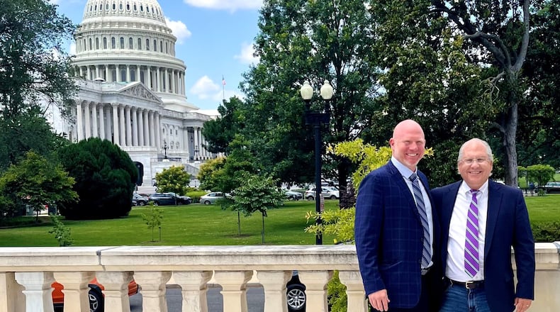 Former UGA football special teams coordinator Scott Cochran, left, and former Georgia Council for Recovery official Jeff Breedlove pose for a photo at Capitol Hill on their first trip to Washington, D.C. to launch their addiction recovery organization.  Photo courtesy of Jeff Breedlove