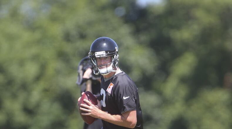 Atlanta Falcons quarterback Matt Ryan (2) throws a pass during their NFL football practice Thursday, June 16, 2016, in Flowery Branch, Ga. (AP Photo/John Bazemore)