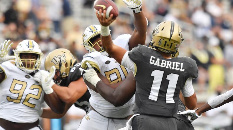 Citing “recent uncertainty in the program,” Georgia Tech defensive tackle Mike Lockhart has made his decision to enter the transfer portal. (Hyosub Shin / Hyosub.Shin@ajc.com)