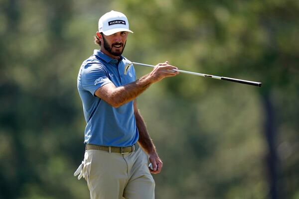 Max Homa points on the 17th green during a practice round at the Masters golf tournament, Tuesday, April 8, 2025, in Augusta, Ga. (AP Photo/Matt Slocum)
