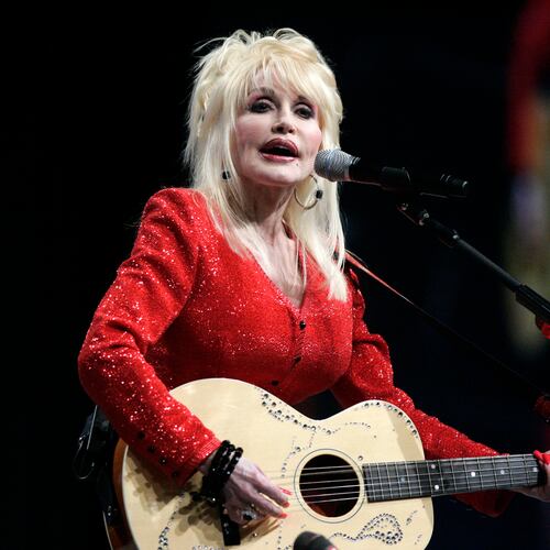 FILE - Dolly Parton performs at a United Way of America convention in Detroit, Friday, May 15, 2009. (AP Photo/Carlos Osorio, File)
