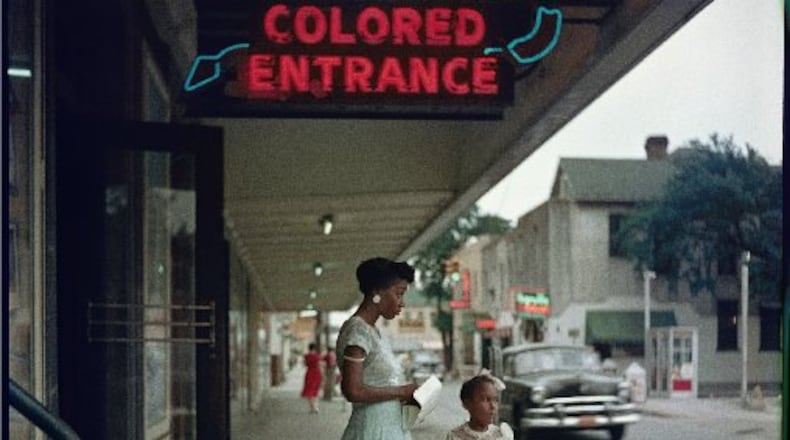 This 1956 image of family members at the "colored" entrance to an Alabama movie theater is included in the exhibit "Gordon Parks: Segregation Story, " opening Nov. 15 at the High Museum of Art.