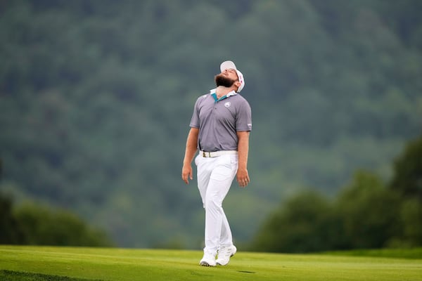 Tyrrell Hatton, of England, reacts after hitting his ball into the rough on the 17th hole during the final round of the U.S. Open golf tournament at Oakmont Country Club Sunday, June 15, 2025, in Oakmont, Pa. (AP Photo/Seth Wenig)
