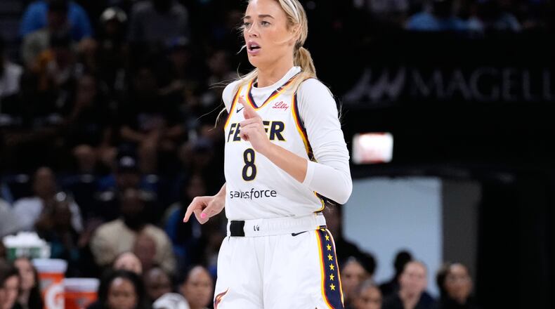 Indiana Fever guard Sophie Cunningham runs on the court during the first half of a WNBA basketball game against the Chicago Sky, Sunday, Aug. 23, 2026, in Chicago. (AP Photo/Nam Y. Huh)