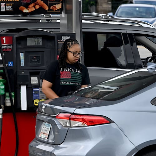 Customers fill up fuel tanks at a QuikTrip station on Northside Drive on Tuesday, July 14, 2026, in Atlanta. (Hyosub Shin/AJC)