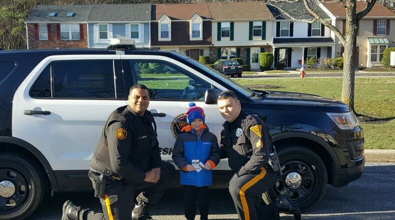 A 7-year-old boy got top honors for his life-saving actions when his mother was having trouble breathing. (Photo: Evesham Township Police/Facebook)