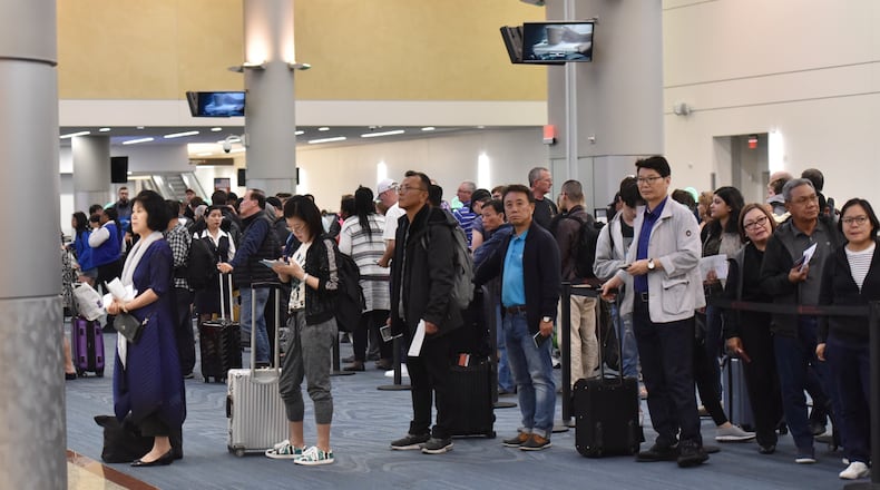 April 12, 2019 Atlanta - International travelers wait in line for processing and interview at customs process area of Hartsfield-Jackson Atlanta International Airport on Friday, April 12, 2019. HYOSUB SHIN / HSHIN@AJC.COM