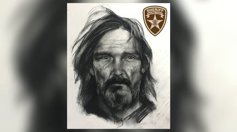 Investigators are searching for a man they say broke into a south Paulding County home last month and then attacked a woman at knifepoint when she came home and surprised him.