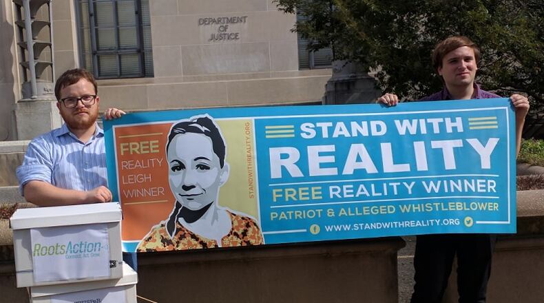 Reality Winner’s supporters said they delivered petitions with more than 16,000 signatures to the U.S. Justice Department’s headquarters in Washington Thursday, asking the agency to drop its charges against the accused National Security Agency leaker.