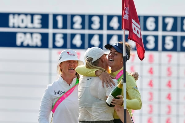 Maja Stark, of Sweden, celebrates with Linn Grant, of Sweden, after winning the U.S. Women's Open golf tournament at Erin Hills Sunday, June 1, 2025, in Erin, Wis. (AP Photo/Matt York)