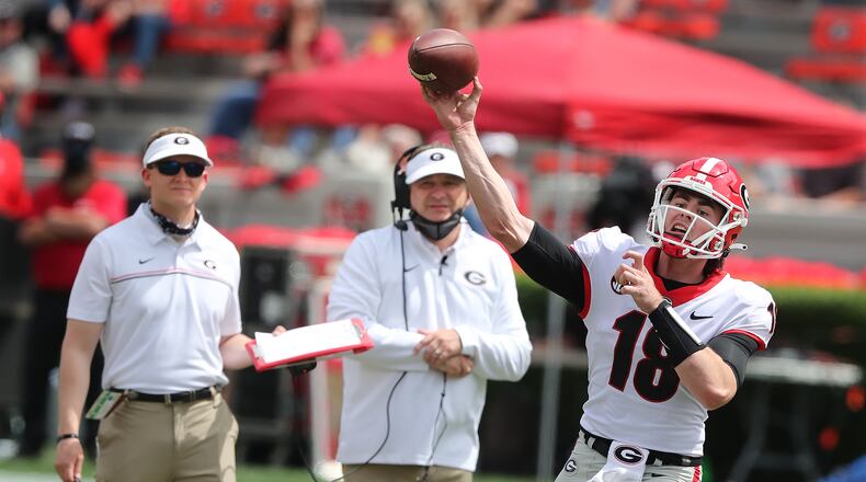 041721 Athens: Georgia head coach Kirby Smart (center) looks on as quarterback JT Daniels leads a touchdown drive against the Black Team during the G-Day Game at Sanford Stadium on Saturday, April 17, 2021, in Athens.   “Curtis Compton / Curtis.Compton@ajc.com”