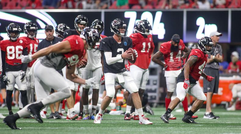 Falcons quarterback Matt Ryan (2) looks to pass during open practice Sunday, July 29, 2018, at Mercedes-Benz Stadium in Atlanta.