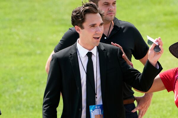 FILE - David Hogg talks to people after speaking at the 60th Anniversary of the March on Washington at the Lincoln Memorial in Washington, Aug. 26, 2023. (AP Photo/Andrew Harnik, File)
