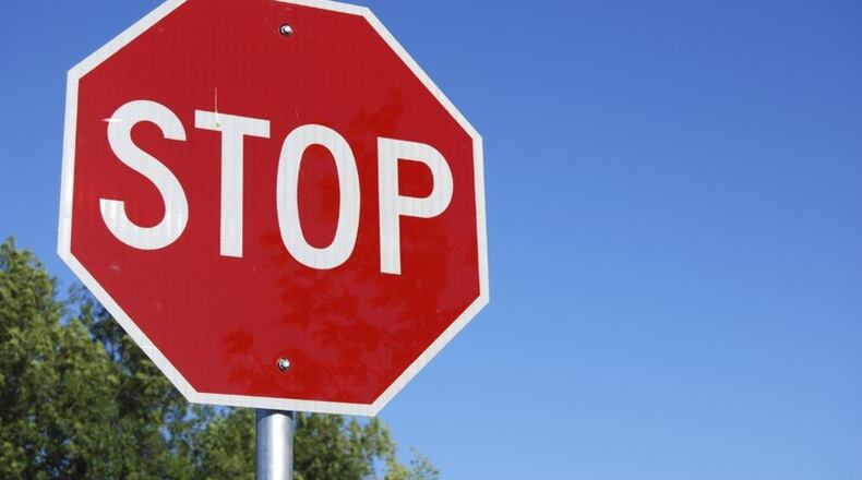 A homeowners association has persuaded Cherokee County to remove a speed hump and install a four-way stop on Eagle Watch Drive in Woodstock. AJC FILE