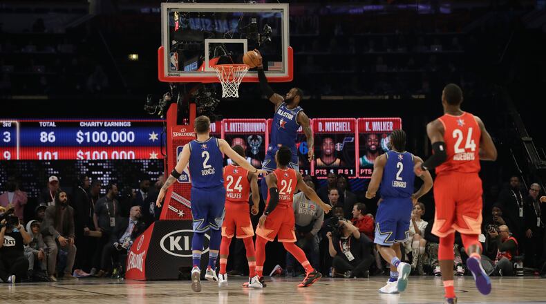 Team LeBron captain LeBron James of the Los Angeles Lakers dunks during the second half of the NBA All-Star basketball game Sunday, Feb. 16, 2020, in Chicago.